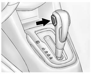 2. Press the + (plus) end of the button on the side of the shift lever to upshift,