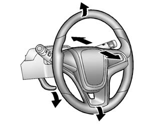 To adjust the steering wheel: