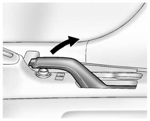 To set the parking brake, hold the brake pedal down and pull up on the parking