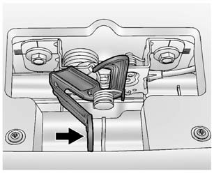 2. Go to the front of the vehicle and move the secondary hood release lever toward