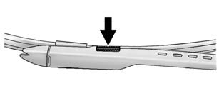 2. Squeeze the tabs on each side of the wiper blade assembly and slide the assembly