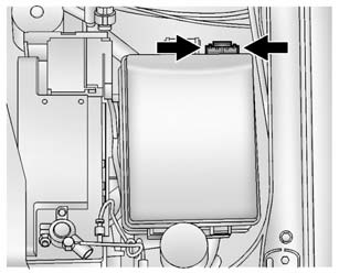 The engine compartment fuse block is on the driver side of the vehicle, near