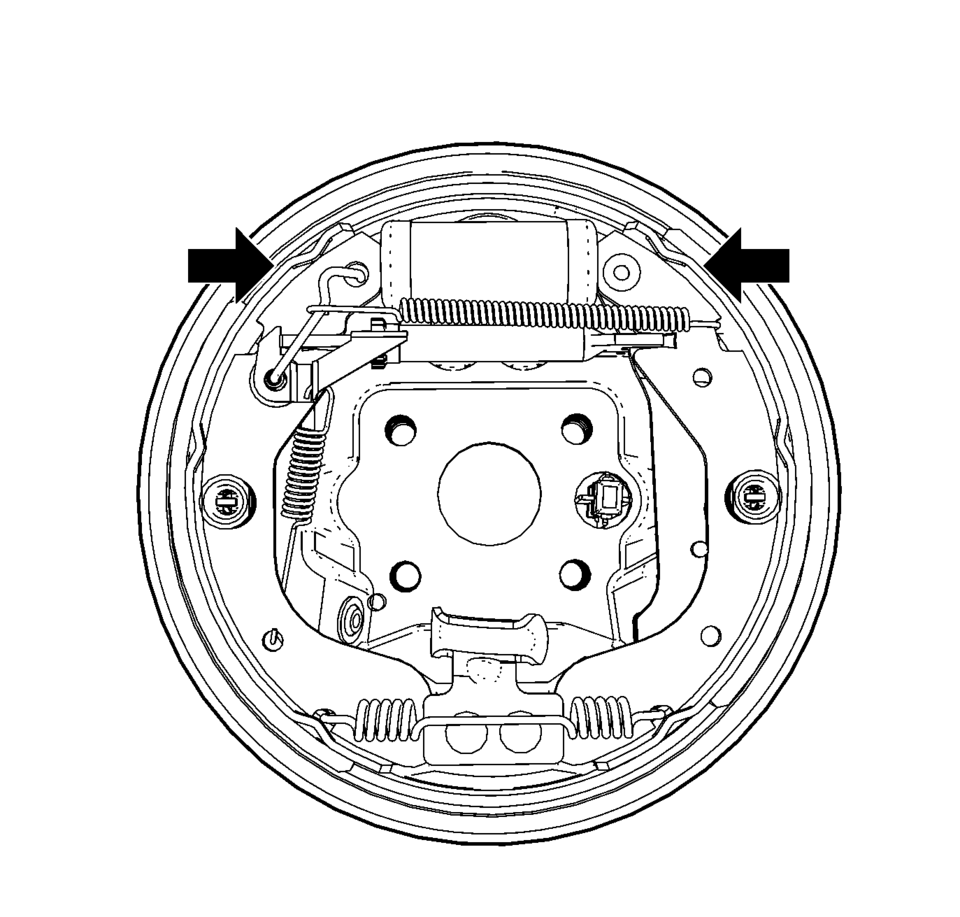 With the rear tire and wheel assemblies and the brake drums removed,