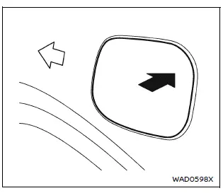 Nissan Armada fuel filler door opening location and push mechanism