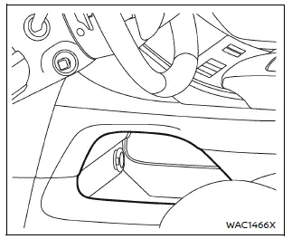 Nissan Armada lower console tray storage area