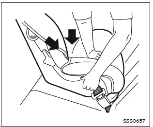 Nissan Armada tightening child restraint by pressing down step 5